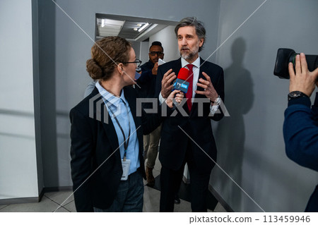 Mature organization representative answers press questions Mature organization representative answers press questions 113459946