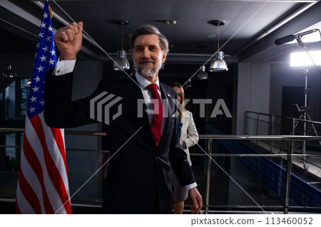 American politician at press conference after campaign speech 113460052