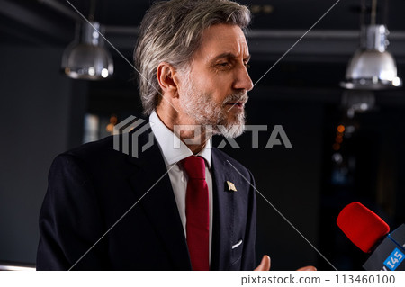 American politician talks with journalists, gives interview for media and television news American politician talks with journalists, gives interview for media and television news 113460100