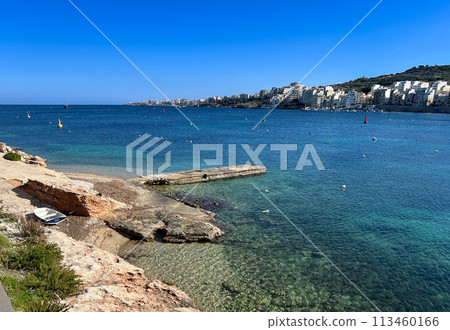 Coast and promenade of the town of Bugibba in Malta on a clear sunny day 113460166