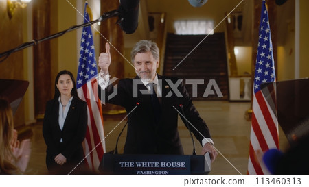 Politician or minister poses on cameras for media in the White House 113460313