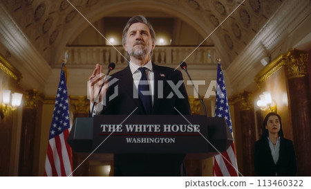 US President pronounces inspirational political speech in the White House 113460322