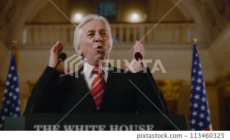 US government representative gives political speech at press conference US government representative gives political speech at press conference 113460325