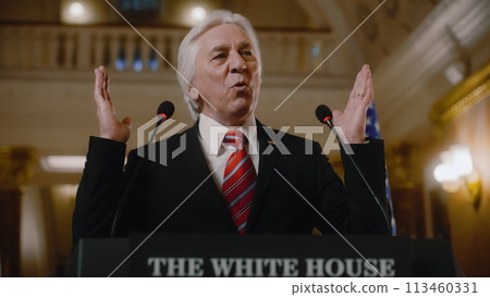 US government representative gives political speech at press conference 113460331