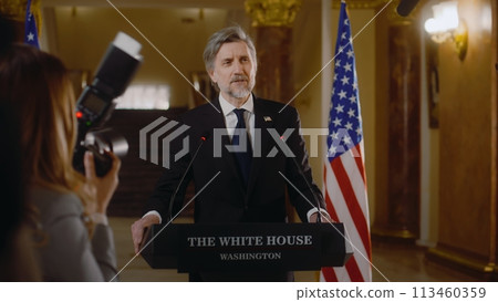Minister or congressman answers journalists questions in the White House Minister or congressman answers journalists questions in the White House 113460359