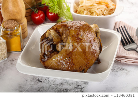 Baked pork knee with spices Baked pork knee with spices 113460381