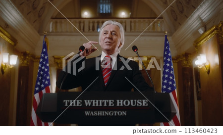 US government representative gives political speech at press conference US government representative gives political speech at press conference 113460423
