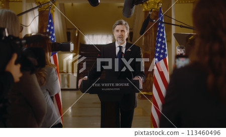 Confident President of the United States speaks at press conference 113460496