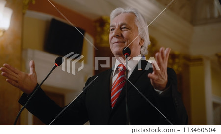 US government representative gives political speech at press conference US government representative gives political speech at press conference 113460504
