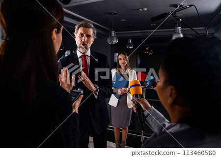 American politician talks with journalists, gives interview for media and television news American politician talks with journalists, gives interview for media and television news 113460580