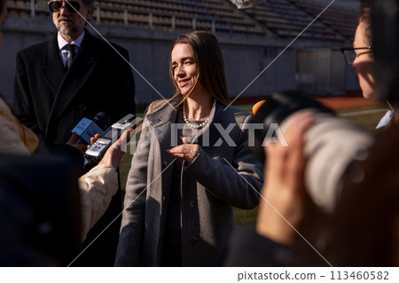 Two organization representative give interview outside Two organization representative give interview outside 113460582