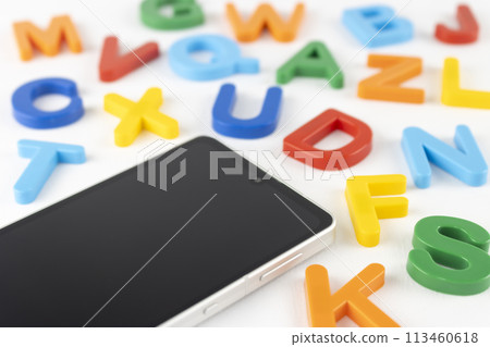 Smartphone and alphabet. Image of English learning app Smartphone and alphabet. Image of English learning app 113460618