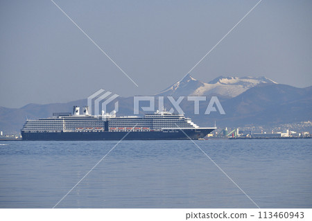 Photographing the cruise ship Westerdam calling at Hakodate Port in Hakodate, Hokkaido in spring, and the scenery of Mt. Komagatake 113460943