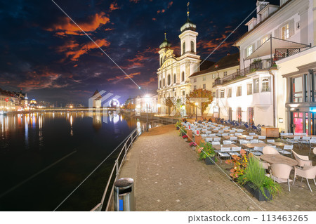 Fabulous historic city center of Lucerne with famous buildings and promenade during night. Fabulous historic city center of Lucerne with famous buildings and promenade during night. 113463265