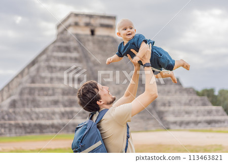 Father and son tourists observing the old pyramid and temple of the castle of the Mayan architecture known as Chichen Itza these are the ruins of this ancient pre-columbian civilization and part of 113463821