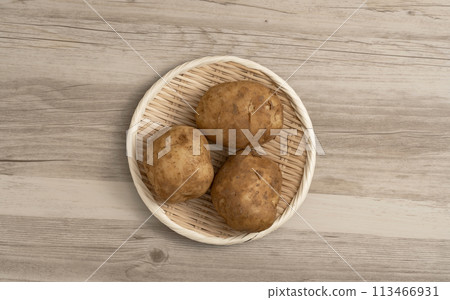 Potatoes on the table 113466931