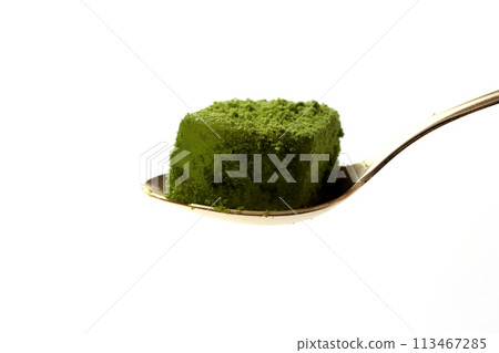 Matcha warabi mochi on a gold spoon Matcha warabi mochi on a gold spoon 113467285