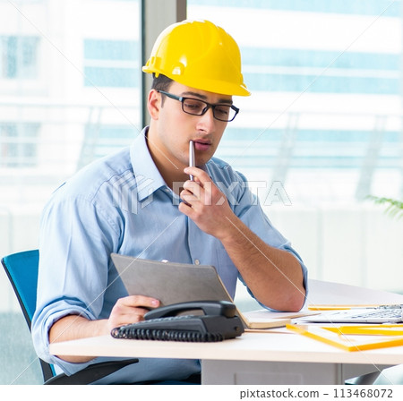 Construction engineer working on new project Construction engineer working on new project 113468072