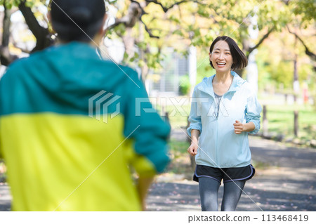Runners passing each other, running 113468419