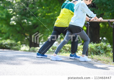 Woman doing warm-up exercise stretching 113468447