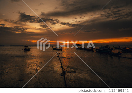 Wooden boat on the beach on the island Wooden boat on the beach on the island 113469341