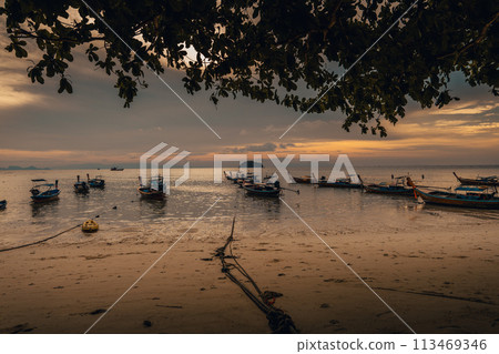 Wooden boat on the beach on the island 113469346