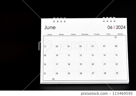Desk Calendar for June 2024. Desktop calendar on a black color. Desk Calendar for June 2024. Desktop calendar on a black color. 113469595