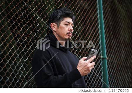 40s, male, smartphone, outdoors 40s, male, smartphone, outdoors 113470965