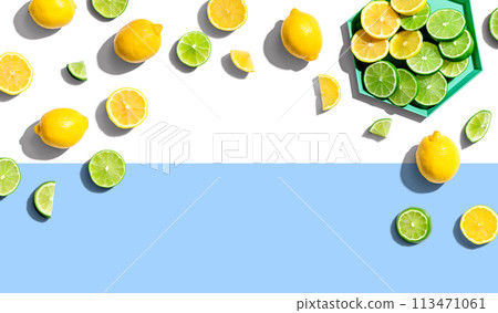 Fresh lemons and limes overhead view Fresh lemons and limes overhead view 113471061