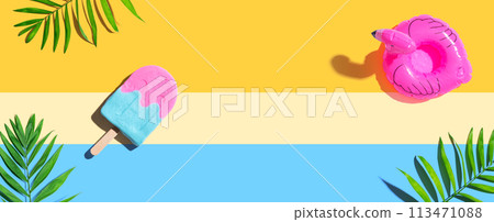 Summer concept with a flamingo float sunlight with a popsicle Summer concept with a flamingo float sunlight with a popsicle 113471088