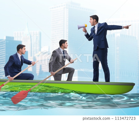 The team of businessmen in teamwork concept with boat 113472723