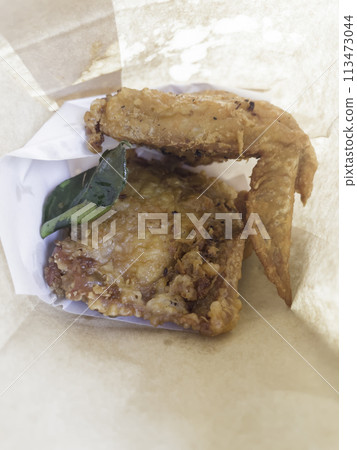 Fried chicken wings with herb Thai street food 113473044
