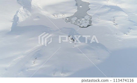Antarctica Aerial Landscape Above Base. Vernadsky Station in Snow Covered Arctic Frozen Nature. Open Water Ocean Glacier Coastline Drone Top Flight 113474116