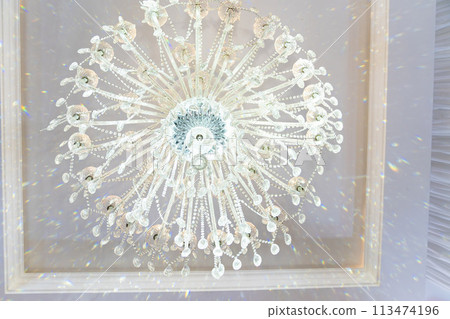 Large ceiling lamp, electric glass chandelier on the ceiling Large ceiling lamp, electric glass chandelier on the ceiling 113474196