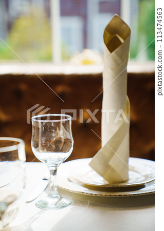 Table setting before the banquet.  113474563