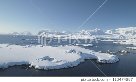 Arctic Epic Ocean Mountain Landscape Aerial View. North Antarctica Open Water Coast Majestic Landscape Overview. Global Warming Nature Concept Drone Flight Arctic Epic Ocean Mountain Landscape Aerial View. North Antarctica Open Water Coast Majestic Landscape Overview. Global Warming Nature Concept Drone Flight 113474897