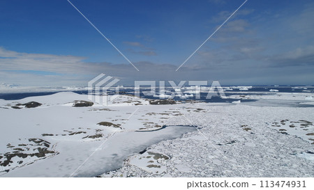 Arctic Polar Mountain Coast Aerial View. Snow Covered Antarctica Ocean Landscape Overview. North Nature Horizon Stunning Panorama Drone Arctic Polar Mountain Coast Aerial View. Snow Covered Antarctica Ocean Landscape Overview. North Nature Horizon Stunning Panorama Drone 113474931