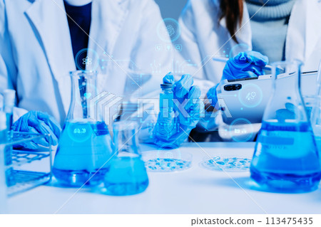 Scientist two woman with tablet and laptop, laboratory and ecofriendly science. Agriculture, research and scientists Scientist two woman with tablet and laptop, laboratory and ecofriendly science. Agriculture, research and scientists 113475435