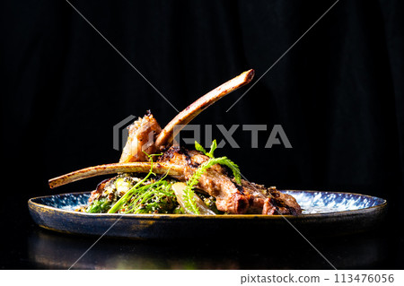 Grilled foods - rack of lamb with parsley, white radish and grocery Grilled foods - rack of lamb with parsley, white radish and grocery 113476056