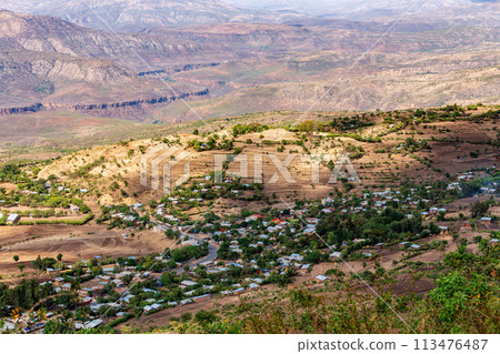 Beautiful mountain landscape with traditional ethiopian houses Southern Nations Ethiopia, Africa. Beautiful mountain landscape with traditional ethiopian houses Southern Nations Ethiopia, Africa. 113476487