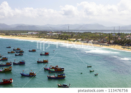 Landscape Of A Fishing Village And Traditional Fishing Boat On The Beach In Binh Dinh Province, Vietnam. 113476756