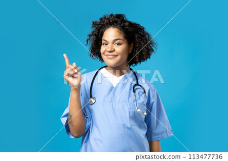 A young African American woman in a doctor's uniform A young African American woman in a doctor's uniform 113477736
