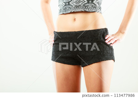 Closeup sexy alluring woman hips and belly. 113477986