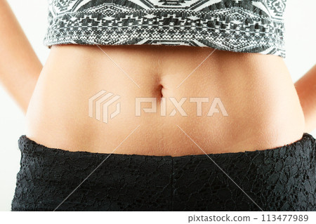 Closeup sexy alluring woman hips and belly. 113477989