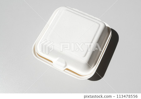White cardboard box for bento cake to take away, highlighted on a white background White cardboard box for bento cake to take away, highlighted on a white background 113478556