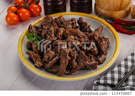 Stew beef slices with gravy 113478667