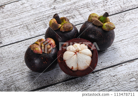 Sweet ripe juicy tropical Mangosteen Sweet ripe juicy tropical Mangosteen 113478711