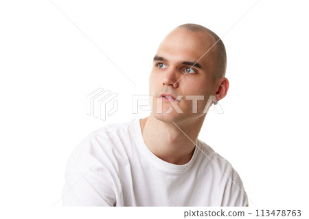 Portrait of handsome bald man with shaved clear spotless face and ear piercing posing isolated on white studio background 113478763
