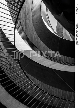 Modern geometric abstraction of several semicircles of different textures and materials. Vertical black and white photo Modern geometric abstraction of several semicircles of different textures and materials. Vertical black and white photo 113479212