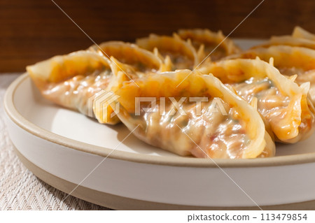 Kimchi dumplings made with kimchi 113479854